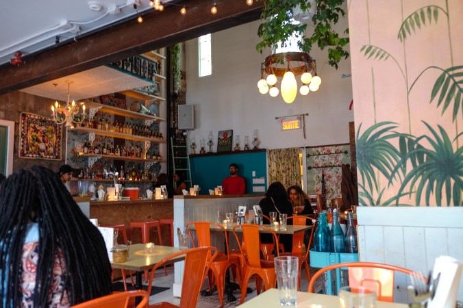 Lively interior of Haitian restaurant Agrikol